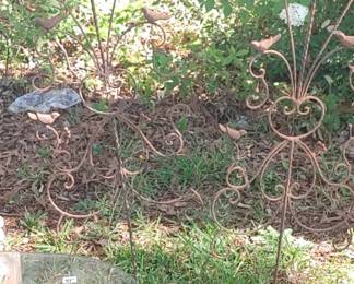 Wrought iron trellis with birds