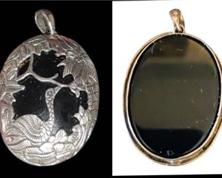 Beautiful black honest in sterling silver filigree design shows nesting bird
