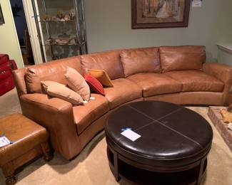 Leather ottoman/coffee table
Semicircular leather sofa