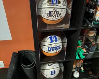3 championship basketballs signed by entire team.