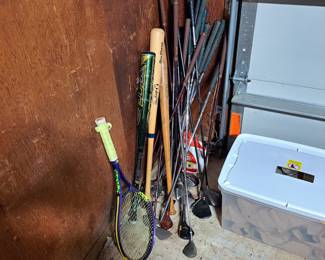Assorted golf clubs
