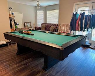 Fischer Pool table new in 1971, new felt added in 1999. This is upstairs so you must bring help to get it moved however thw homeowner knows how to get it taken apart.