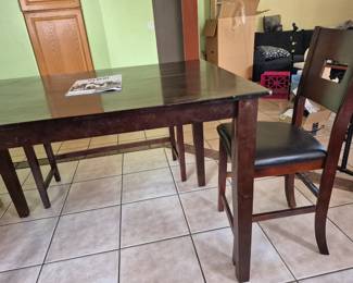 Wood table - high - expands. 2 chairs and bench.