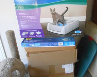Self cleaning litter box plus filters, never used
