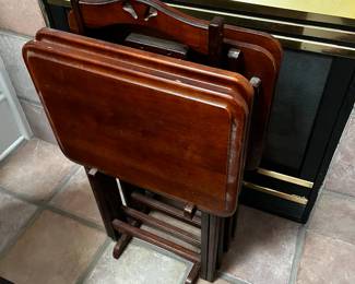 #67 Set of 4 Wood TV Trays on Stand $25.00
