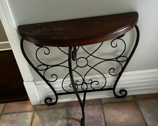 #25 entry half moon table with metal legs 32x13x31 $75.00