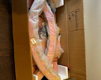 #22 unassembled cat condo with wheels $65.00