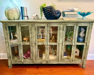 Soooo Stylish and Perfect for Entertaining! Use for a Buffet with Glass Doors for Storage to display your lovely serving Dishes. Or use to Hold your TV with your Collectibles! This is a Lovely One Of A Kind Piece! Large so look at pictures for Dimensions!