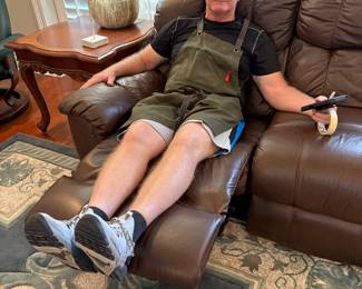 Comfy Brown Leather Recliner Couch $700. Matching Loveseat $500