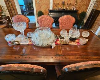 Crystal and glass pieces; dining table not for sale.