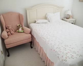 Cottage chic double bed; pink wingback chair