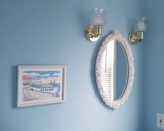 Wall mirror; wall sconces