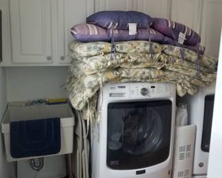 Laundry room cabinets match kitchen cabinets!