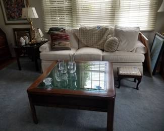 White sofa made in USA; Disney Mickey Mouse shadowbox coffee table