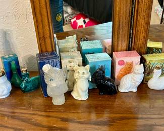 Collection of vintage Avon Perfumes with boxes