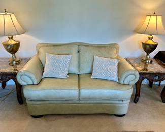 Very nice stone top side tables with lamps & comfy leather sofa
