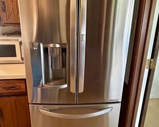 Fantastic LG Stainless Refrigerator- if you’re needing any new appliances, this sale would be the place to score good deals