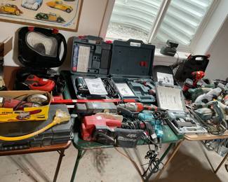 Large assortment of different electric and battery tools