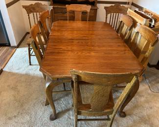 Dining Room Table and Chairs 2 Leaves 60"L x 40"W 29"T as Seen (does not include leaves measurements) One chair has cane damage $400.00