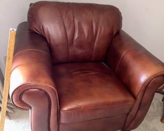 Leather Chair Measures 35"T x 42"W x 37"D $175.00