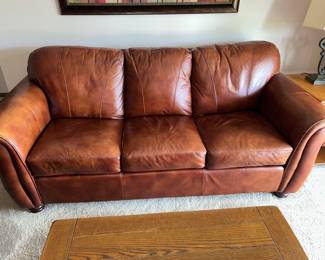 Leather Sofa 85"L x 35"T x 37"D $400.00