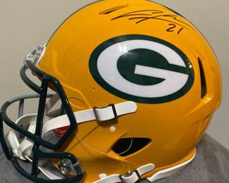 Dual team Charles Woodson signed helmet