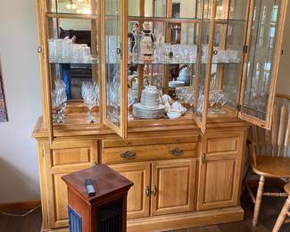 Beautiful 2 piece china hutch with mirrored back, 3 display shelves and lower cabinet storage