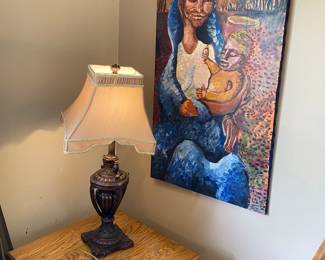 Religions art, lamp and end table