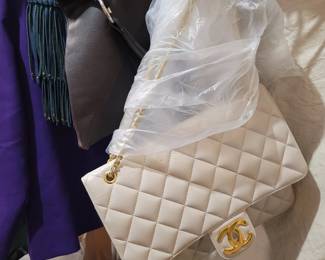 Chanel business carry. Needs minor repair.
