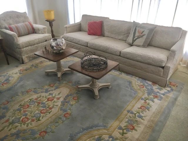 Sculped wool Chinese rug & Heritage tables