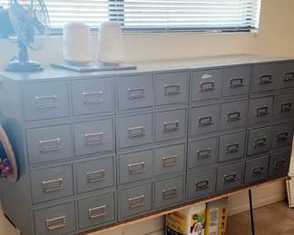 Vintage Industrial 32 Drawer File Cabinet 59in wide 47in tall 17 in deep. View by appointment only available for pre-sale.