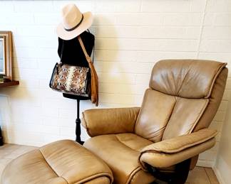 Thomasville leather recliner with ottoman.