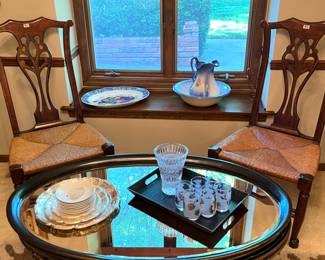 (4) Chippendale dining chairs with oval glass top cocktail table