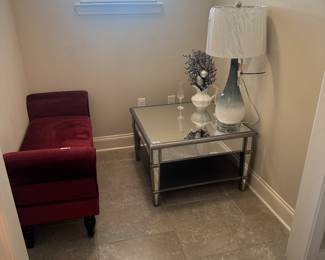 Ashley mirrored table and red velvet bench.
