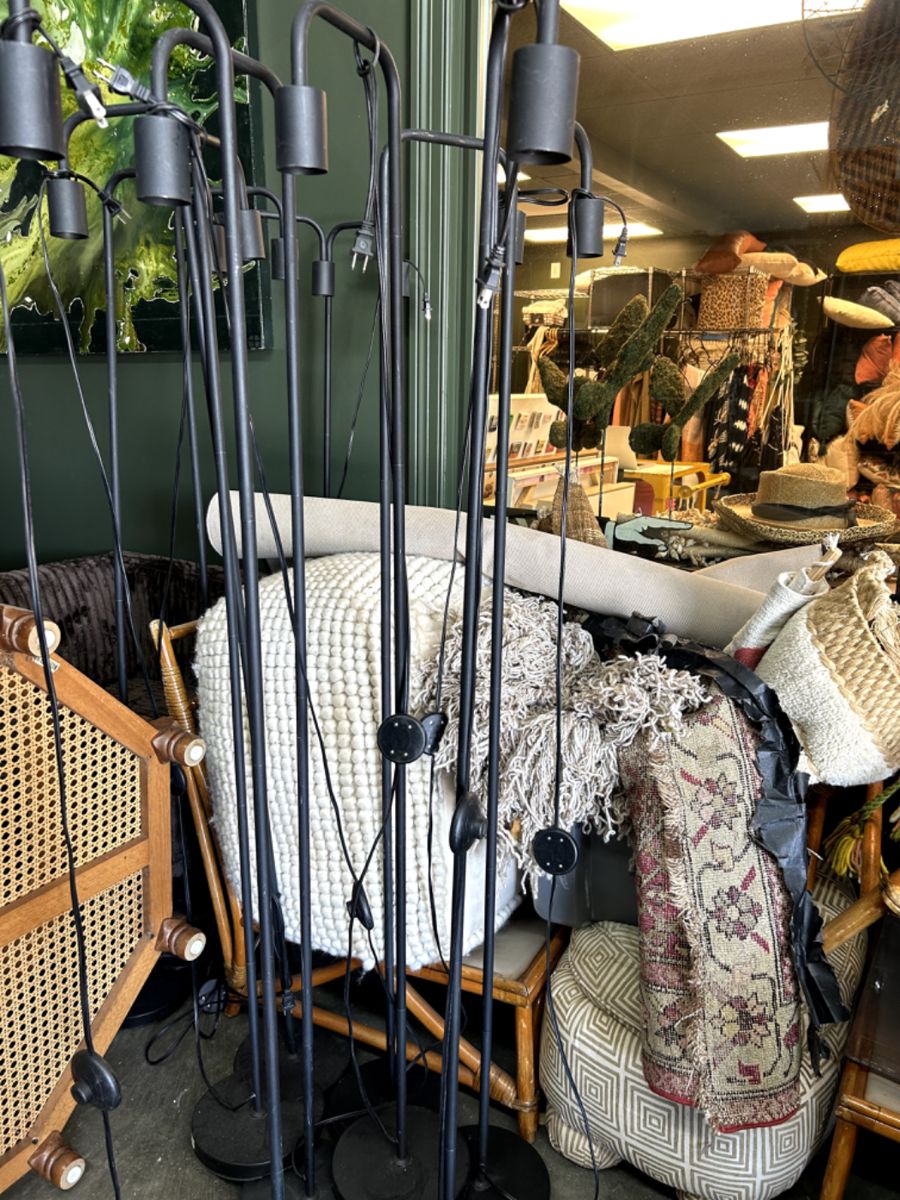 Floor lamps, rugs, ottomans, wall hangings galore!