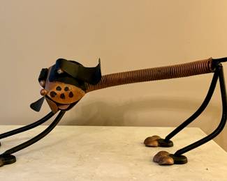 Metal sculptural dog