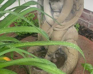 Concrete cherub statues