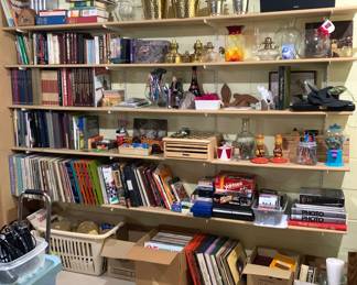 Travel books, barware, Records, games, oil lamps, music tapes