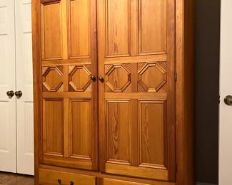 Wardrobe/entertainment cabinet
55”w x 76h x 20”d