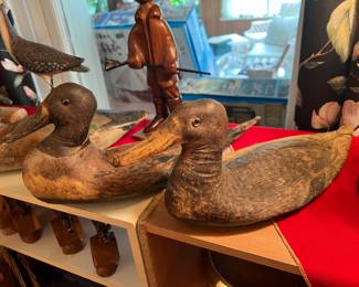 Two of 3 Antique leather duck decoys