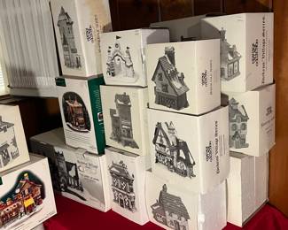 Huge collection of Dickens and other Christmas houses spread though out various rooms of the house