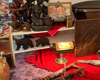Wood carvings, swords and other collectibles