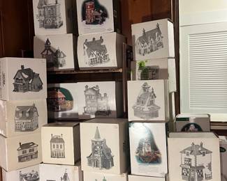 Huge collection of Dickens and other Christmas houses spread though out various rooms of the house