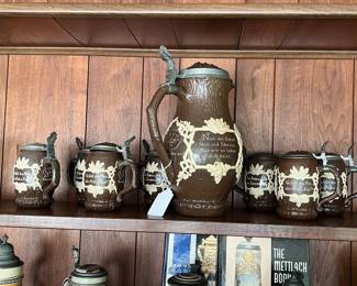 Large Mettlach beer pitcher w/ 7 beer steins