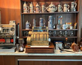 Vintage slot machine, Antique National cash registers, German steins, etc