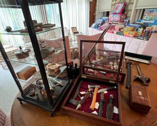 Case full of Marbles hatchets, Marbles knives and German knives