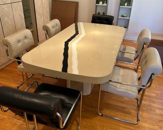 Table measures 75"L x 40"W x 30"H.