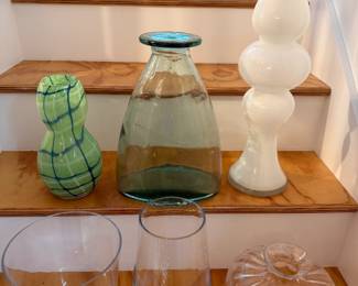 Top Row Blown Glass: Murano Style Green and Blue Glass Vase, Spanish Style Green Tinted Vase, White Murano Style Glass Vase. Bottom Row: Clear Glass Vases