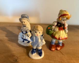 Dutch Girl and Boy Porcelain Figurines, Dutch Girl Porcelain Figurine with Basket Picking Flowers.