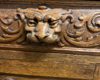 Detail of lion drawer pulls on Oak and tiger oak credenza